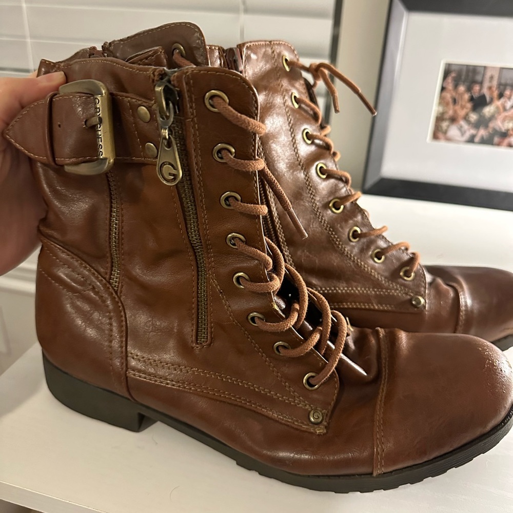 Guess combat boots in brown; size 10.